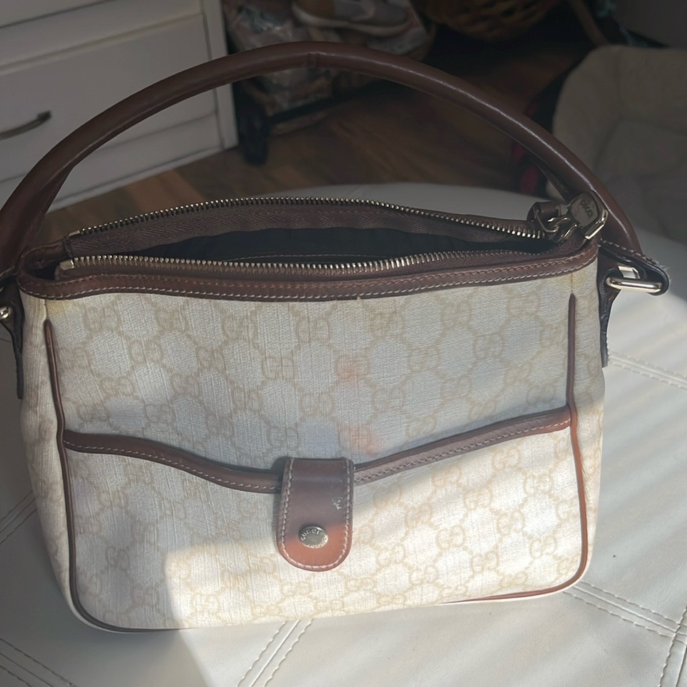 GUCCI bag approximately 7” x 9” off white with brown leather gorgeous!
